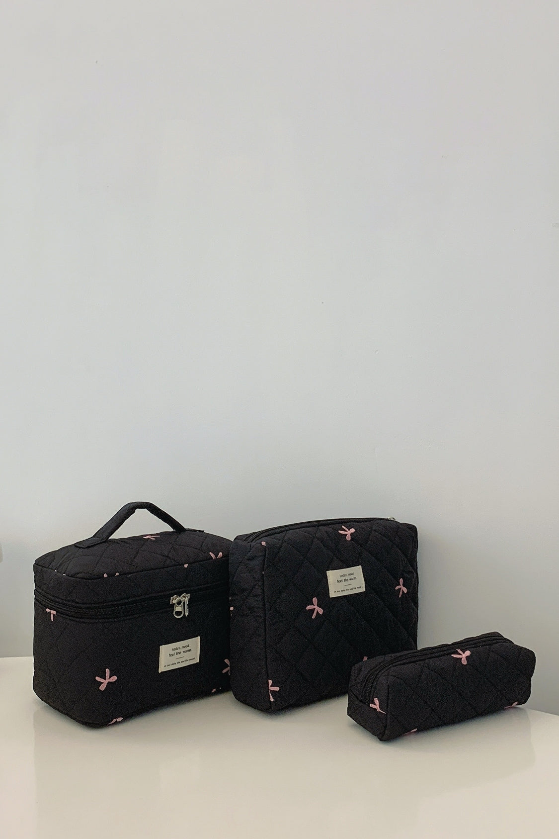 3 Piece Bow Quilted Storage Bag Set