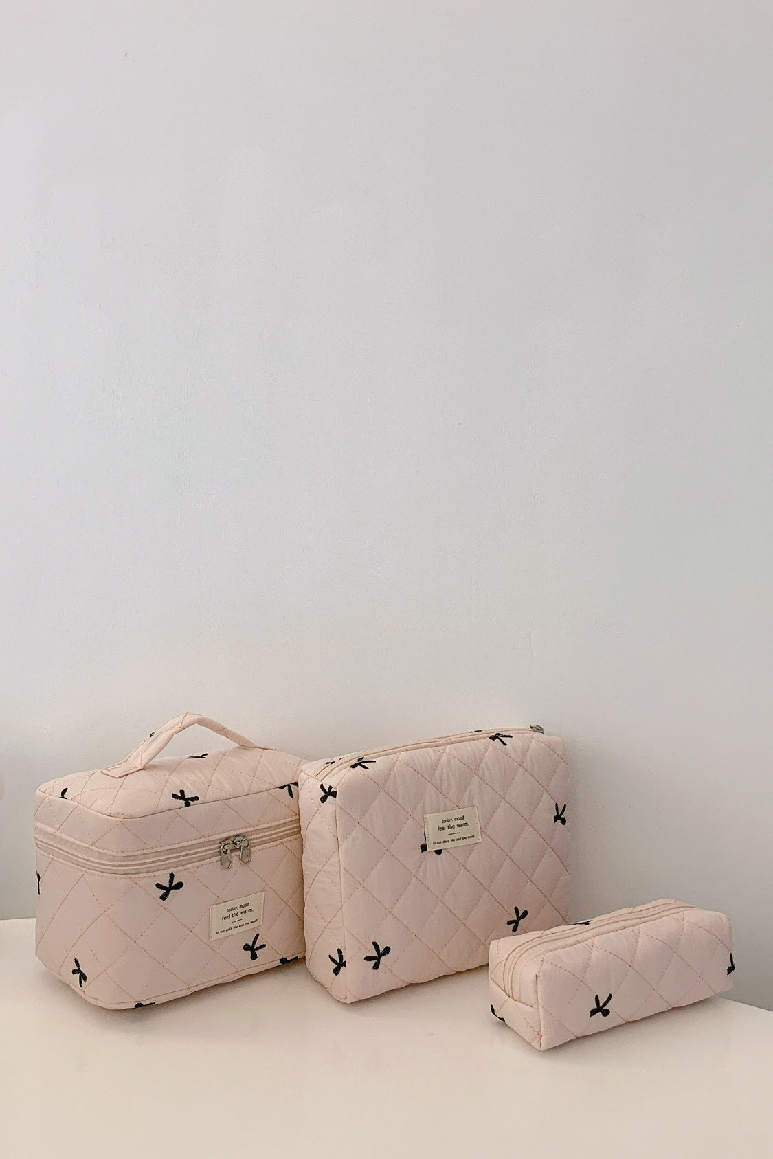 3 Piece Bow Quilted Storage Bag Set