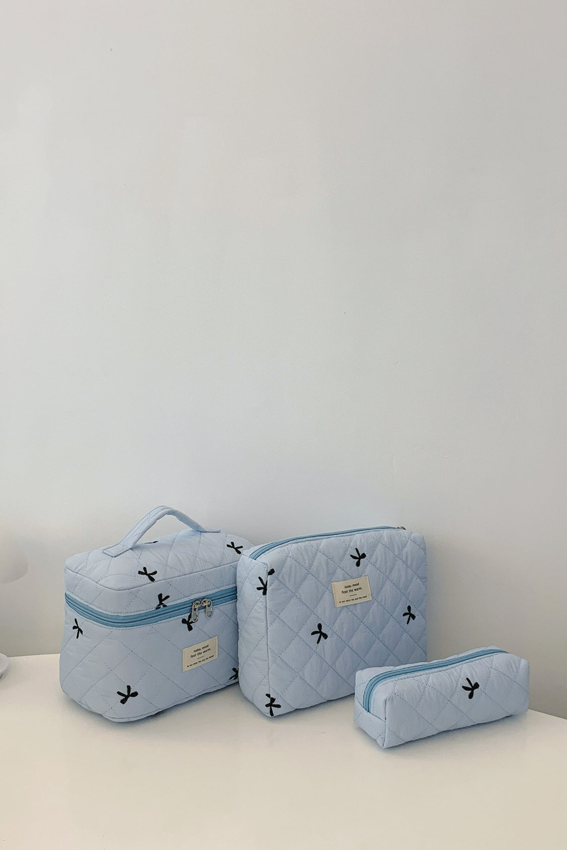 3 Piece Bow Quilted Storage Bag Set